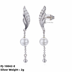Artisan Crafted Beauty: Unique Silver and Pearl Dangle Earrings