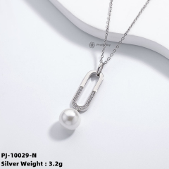 Artisan Beauty: Unique Silver Pearl Pendant Necklace