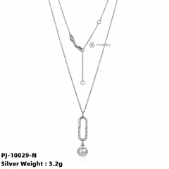 Artisan Beauty: Unique Silver Pearl Pendant Necklace