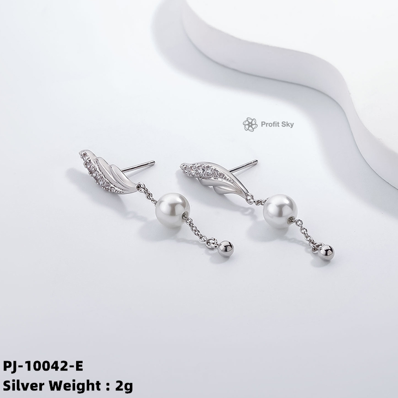 Artisan Crafted Beauty: Unique Silver and Pearl Dangle Earrings