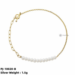 Elegance Defined: Silver Pearl Charm Bracelet