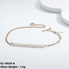 Elegance Defined: Silver Pearl Charm Bracelet