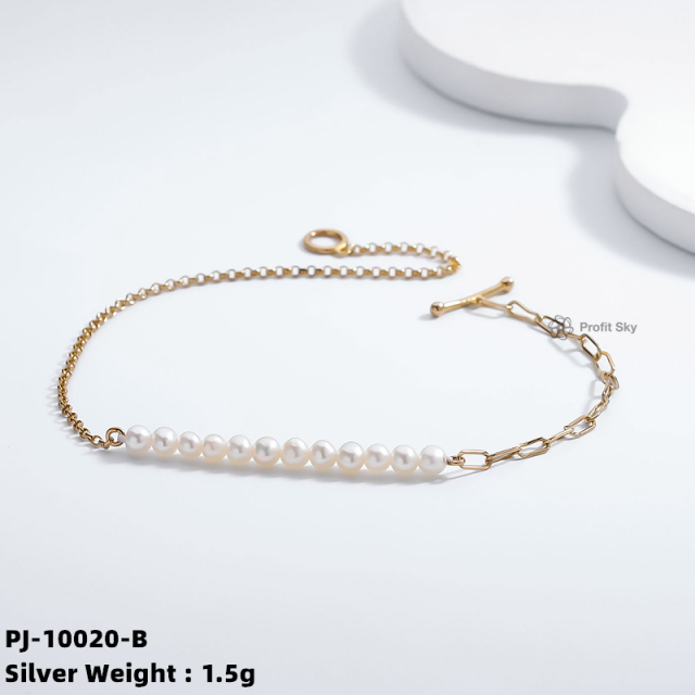 Elegance Defined: Silver Pearl Charm Bracelet