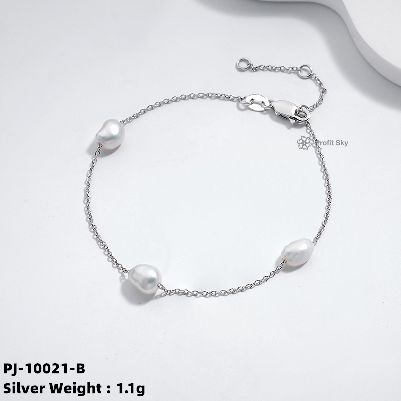 Elegance Defined: Silver Pearl Charm Bracelet
