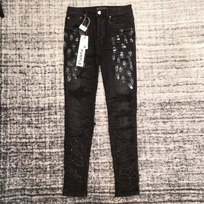 1:1 quality version Reversible ripped and inked jeans