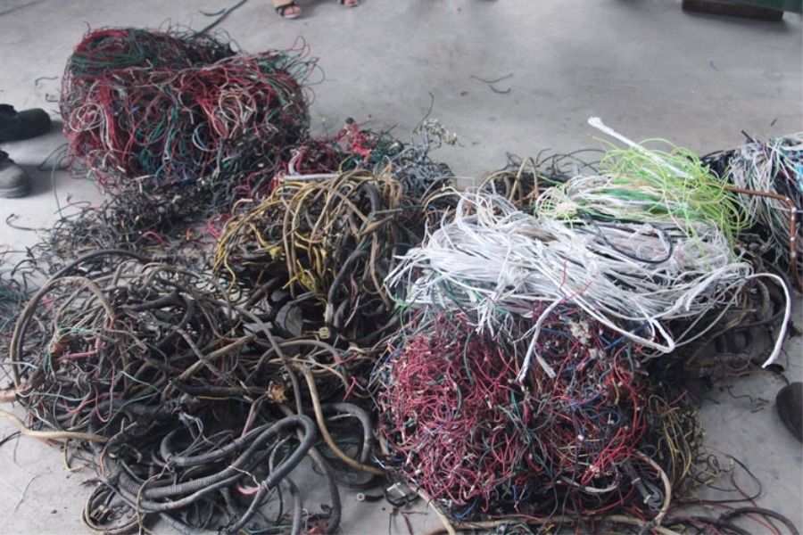 SOYU Various scrap copper wires and waste cables raw materials ready for recycling process.
