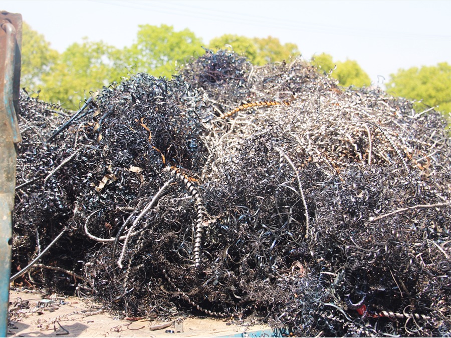 Bulky steel shavings and bird nest metal turnings in recycling yard