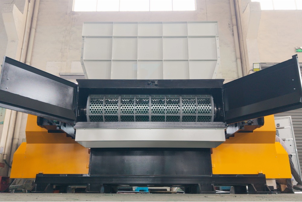 Interchangeable screen for industrial shredder