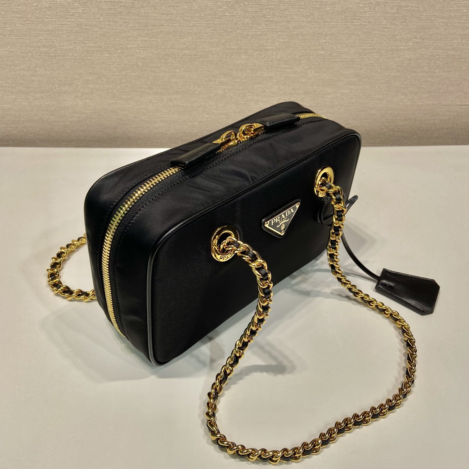 高仿Prada*ReEdition系列單肩包1BB121A小號免檢版