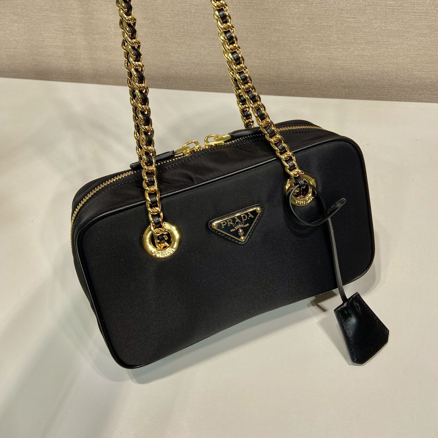 高仿Prada*ReEdition系列單肩包1BB121A小號免檢版