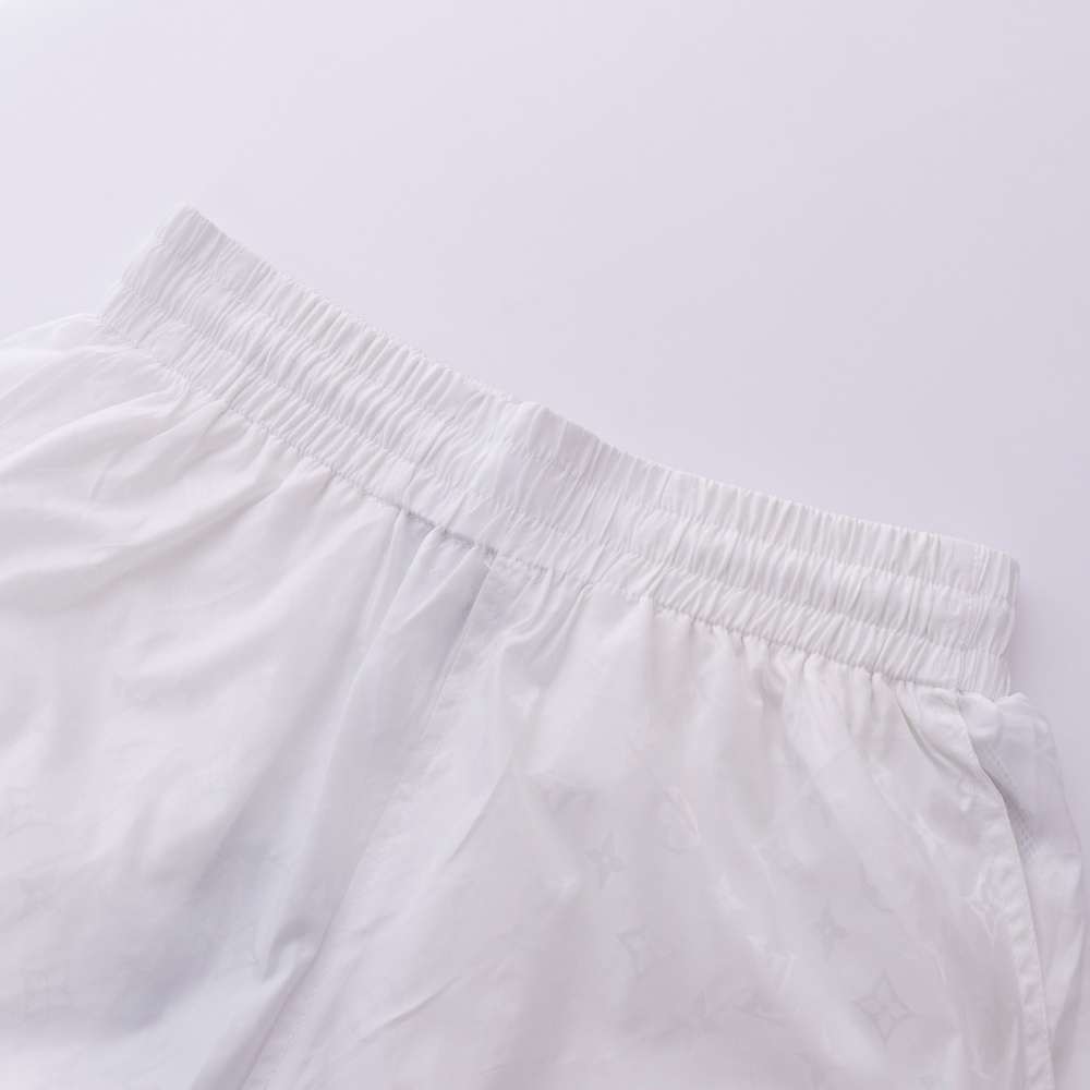 高仿LV*SS24系列1AFR0011暗紋提花沙灘褲白色