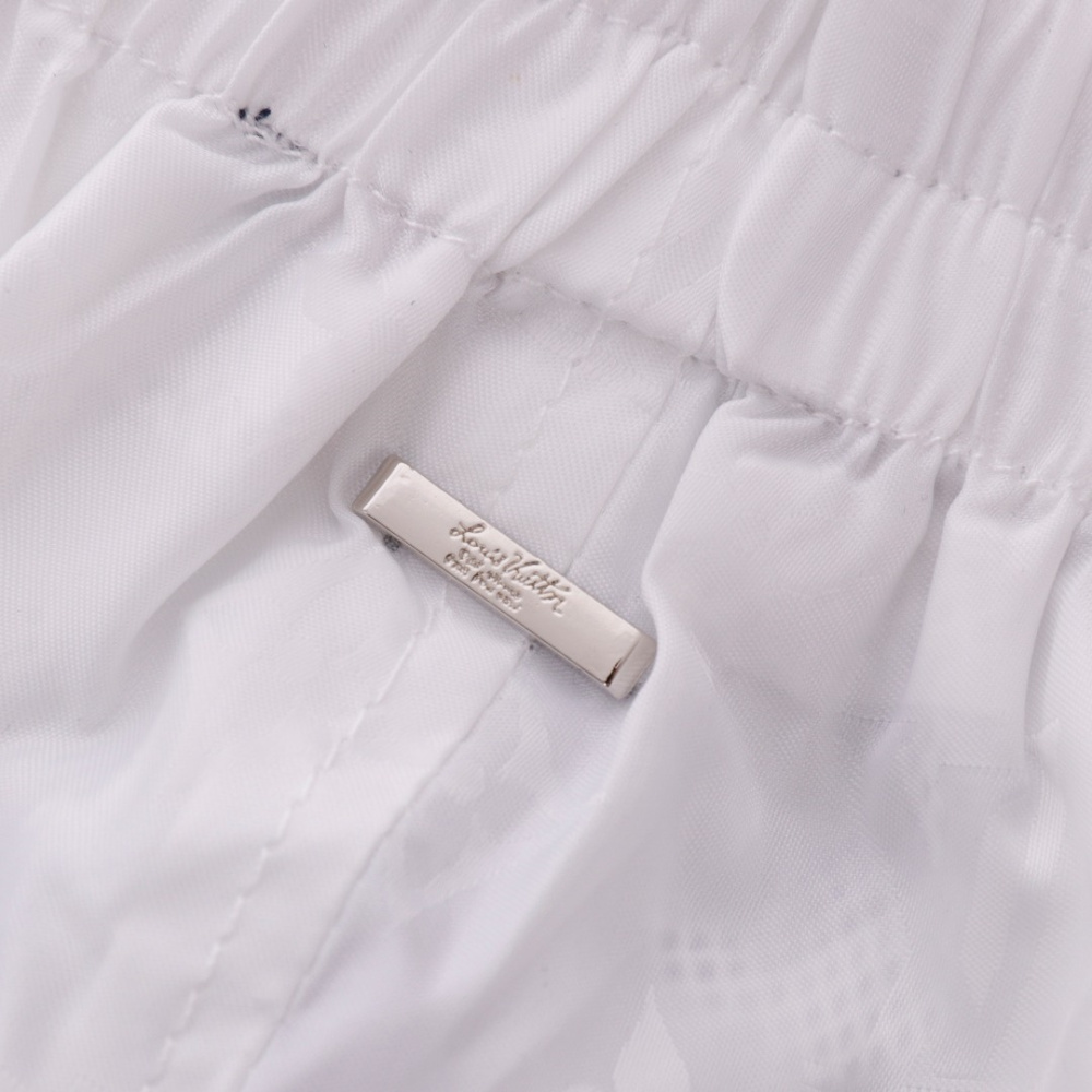 高仿LV*SS24系列1AFR0011暗紋提花沙灘褲白色