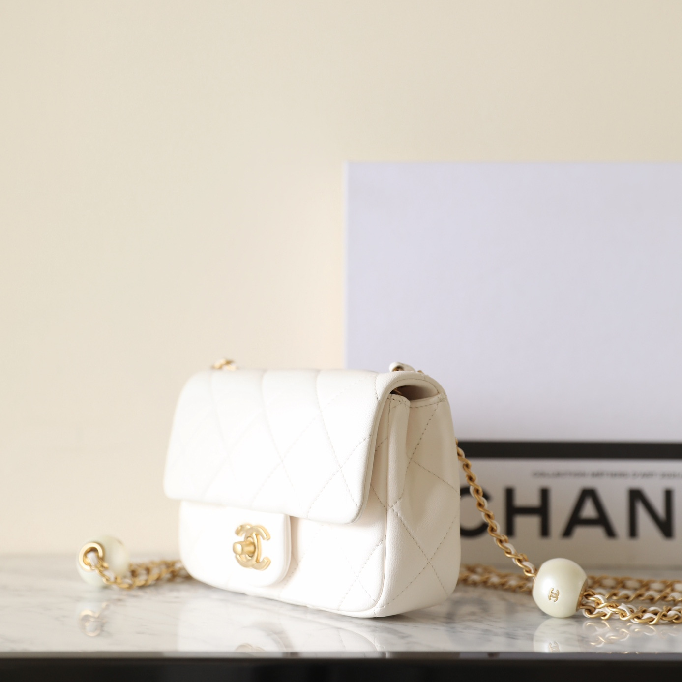 高仿Chanel*24S系列AS4861湯圓珍珠鏈條Mini袋白色免檢版