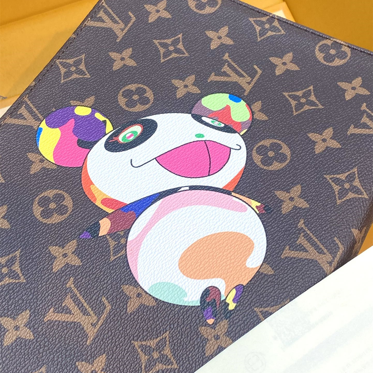 高仿LV*M13762Murakami Takashi聯名款三合一手拿包免檢版