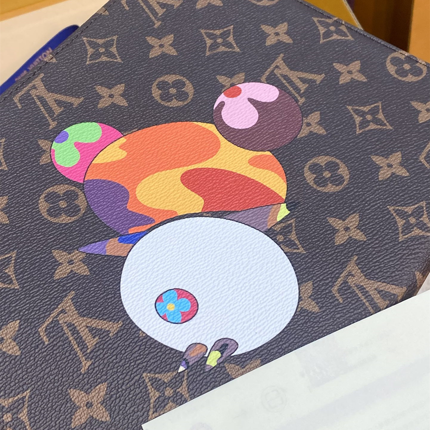 高仿LV*M13762Murakami Takashi聯名款三合一手拿包免檢版