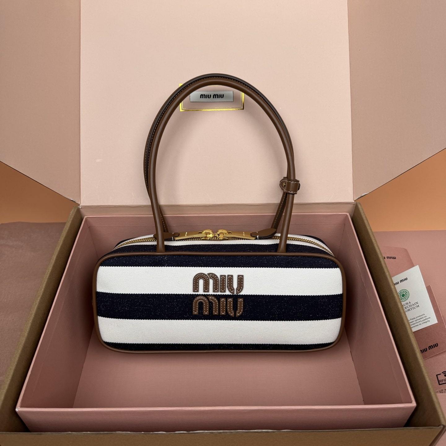 高仿miumiu*Beau系列5BB173牛皮帆布手提包藍白色免檢版