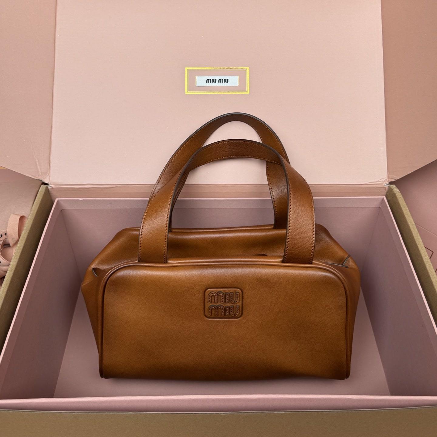 高仿miumiu*5BB182小牛皮手提包干邑色免檢版