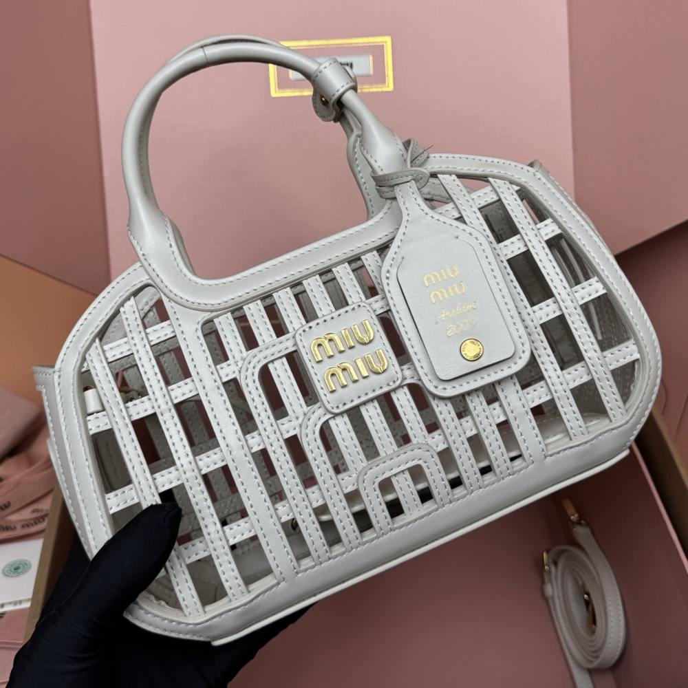 高仿miumiu*5BA294小牛皮鏤空手提包白色免檢版