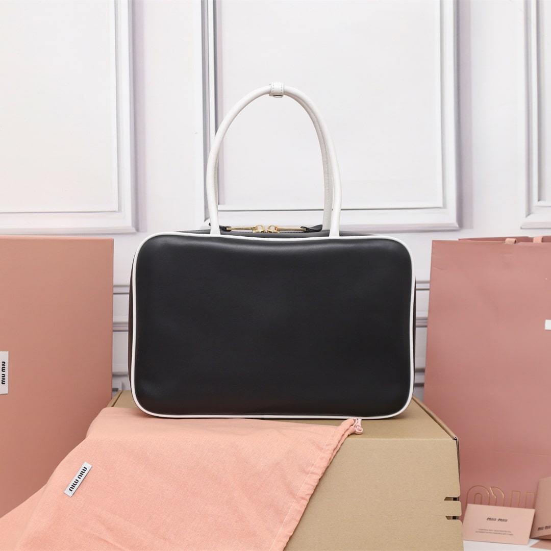 高仿miumiu*Beau系列5BB172小牛皮手袋黑白色免檢版