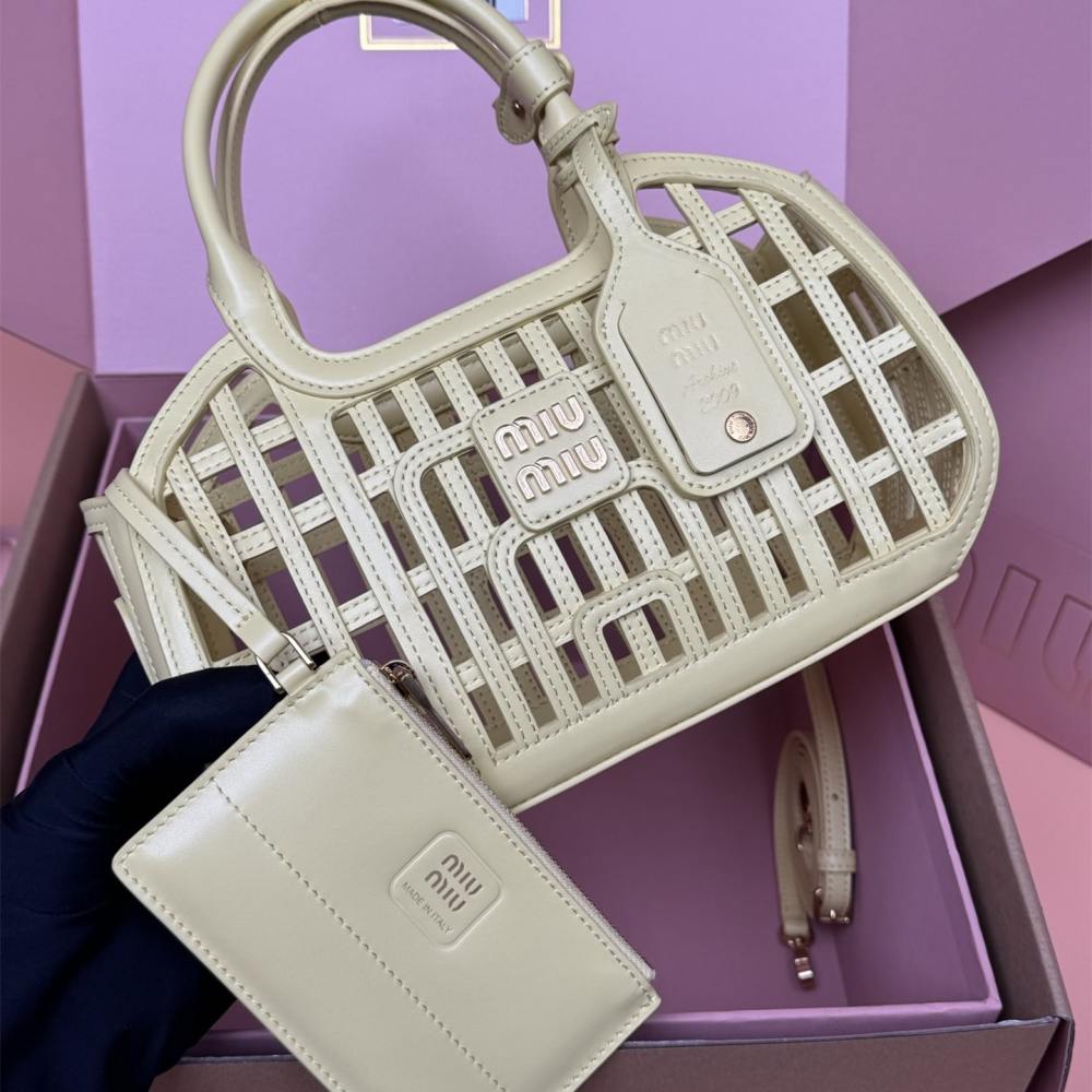 高仿miumiu*5BA294小牛皮鏤空手提包黃色免檢版
