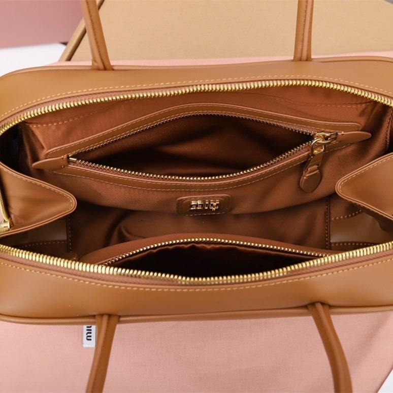 高仿miumiu*5BB172壓紋LOGO手提包小牛皮白蘭地免檢版
