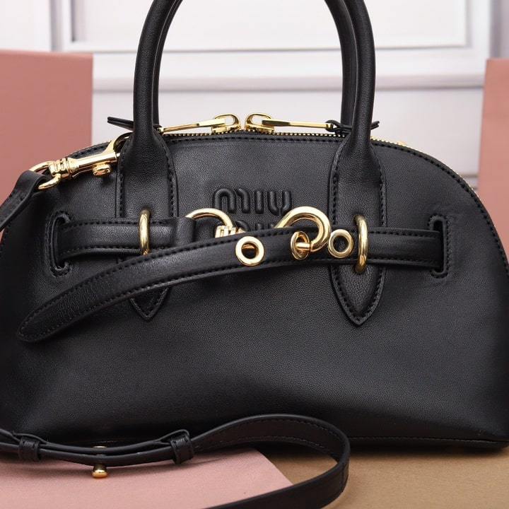 高仿miumiu*Aventure系列5BB169手提包黑色小號免檢版