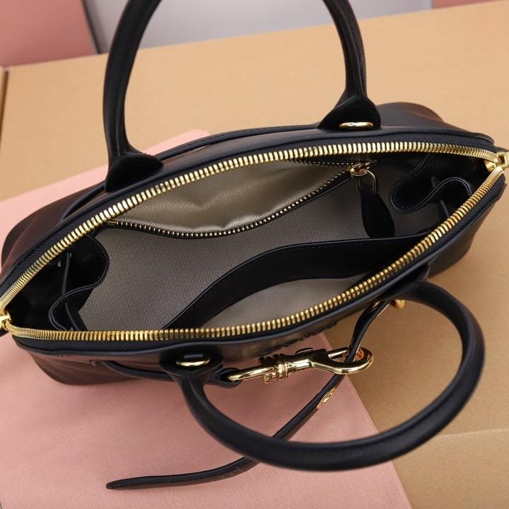 高仿miumiu*Aventure系列5BB169手提包黑色小號免檢版