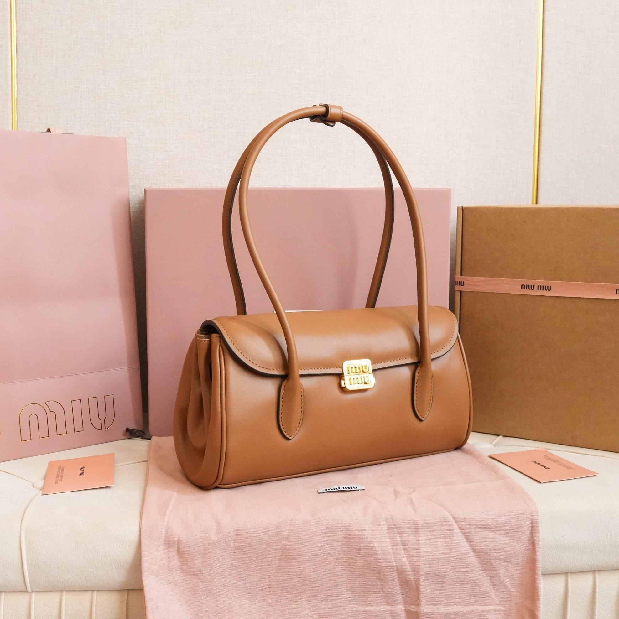 高仿miumiu*5BD265手提單肩包棕色免檢版
