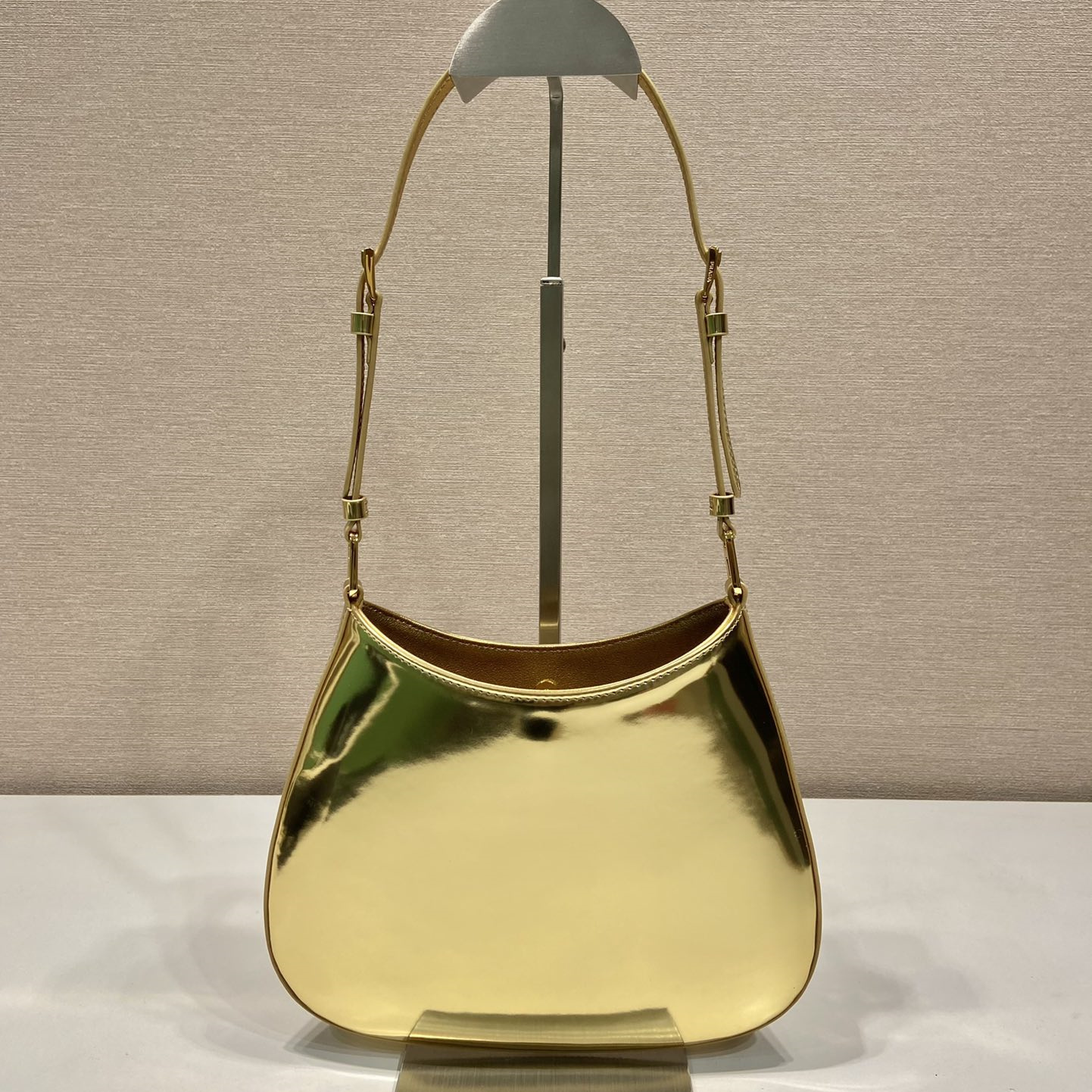高仿Prada*Cleo系列1BC169亮面牛皮Hobo手提包鉑金色純原版本