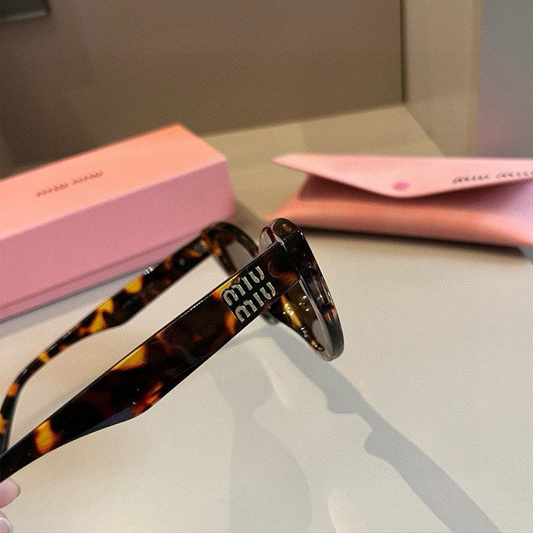 MIUMIU Sunglasses