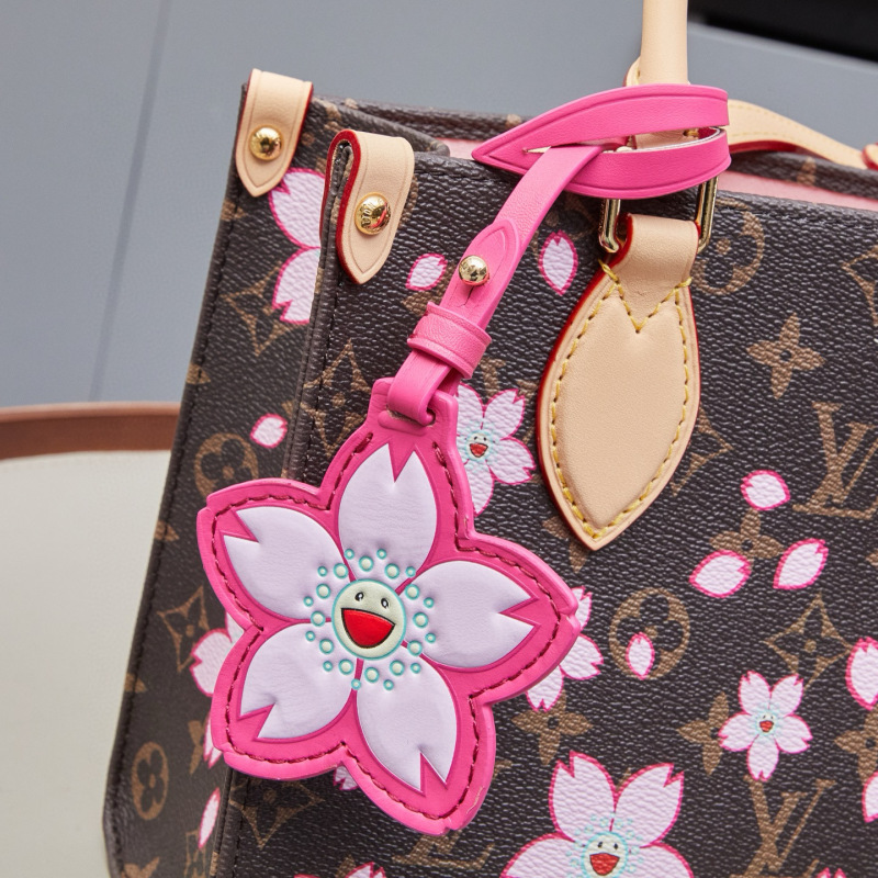 LV x TM OnTheGo PM Tote Bag