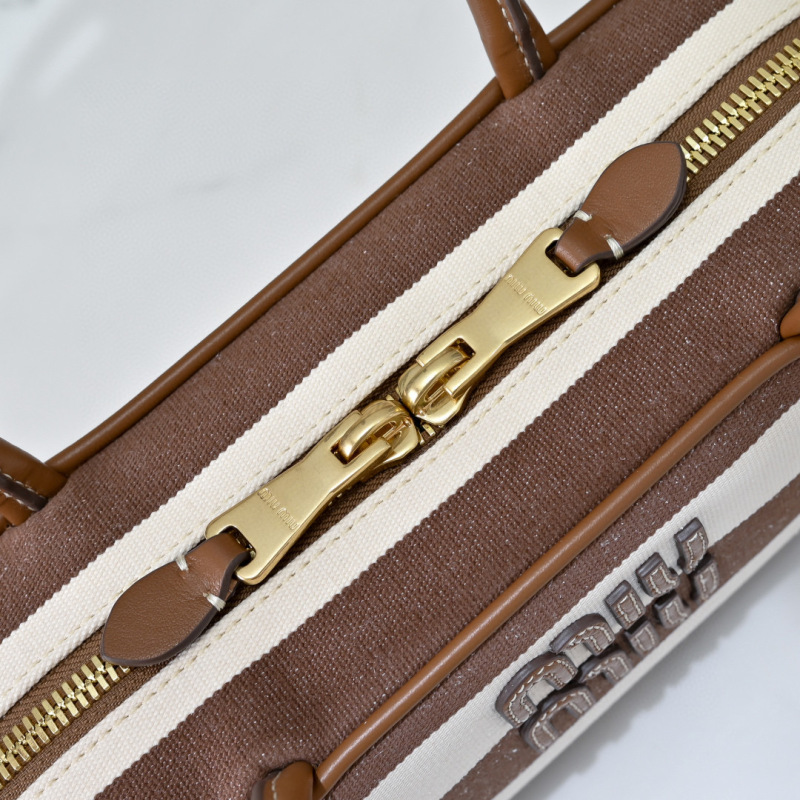 MIU MIU Beau Canvas and Leather bag