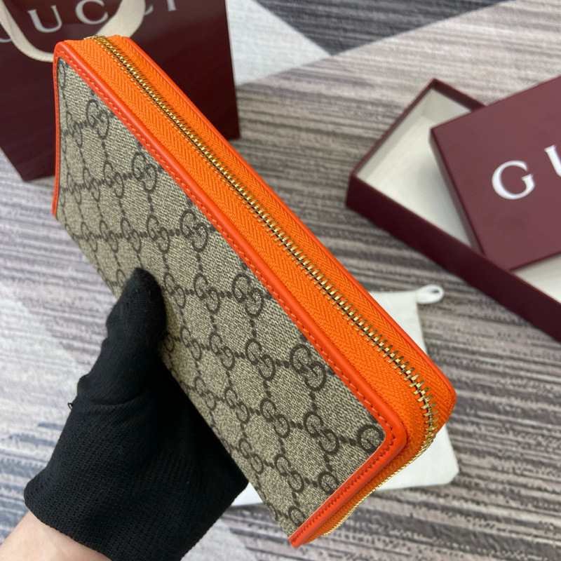 GUCCI GG Emblem zip around wallet