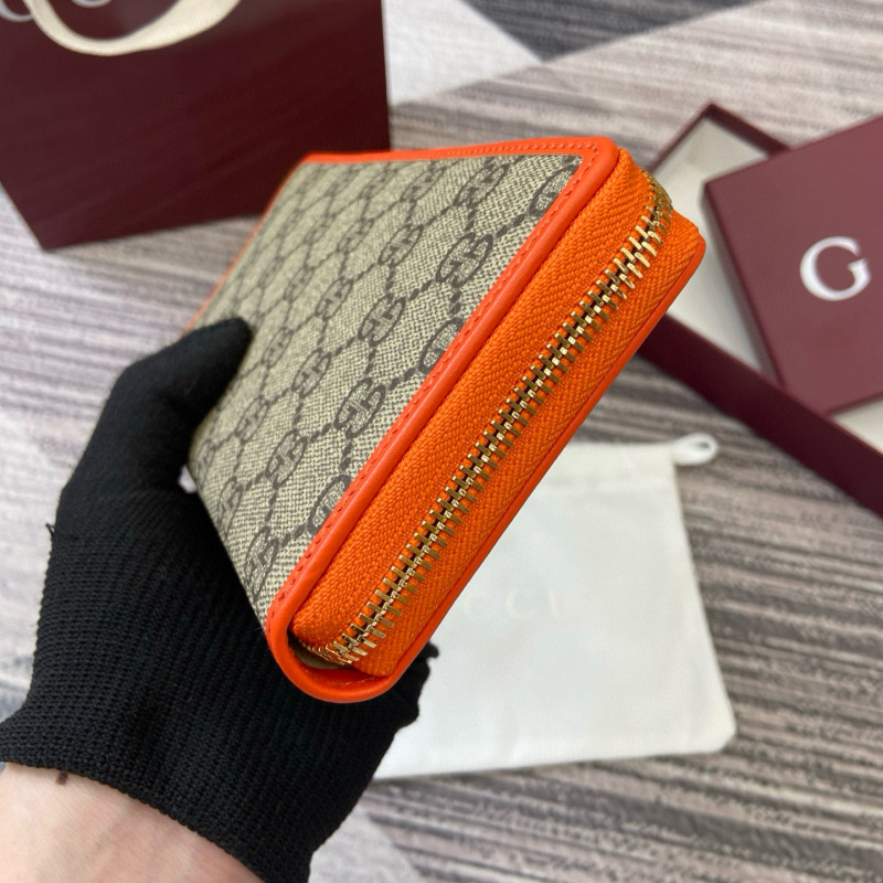 GUCCI GG Emblem zip around wallet