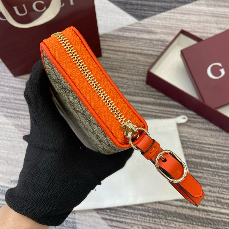 GUCCI GG Emblem zip around wallet
