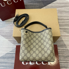 GUCCI GG Emblem small bucket bag