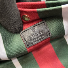 GUCCI GG Emblem small bucket bag