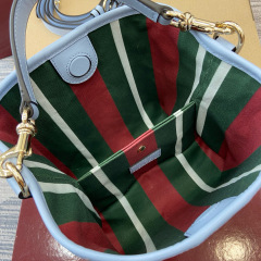 GUCCI GG Emblem small bucket bag