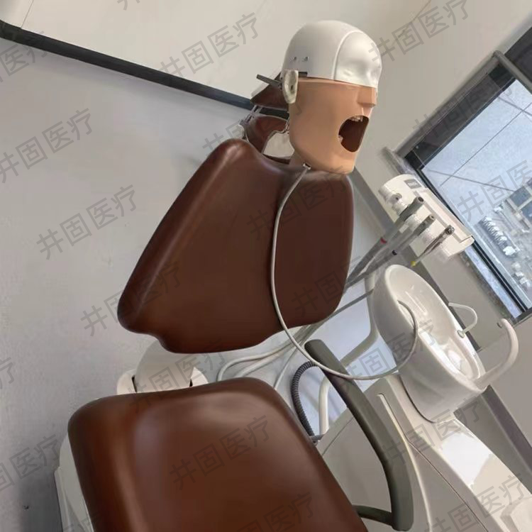chair-mounted dental simulator attached to a dental chair for preclinical training