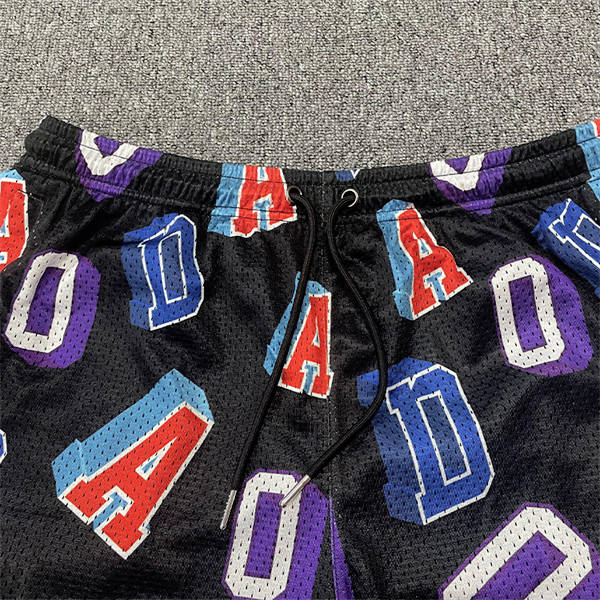Short de basket-ball tendance en maille avec broderie de lettres par sublimation