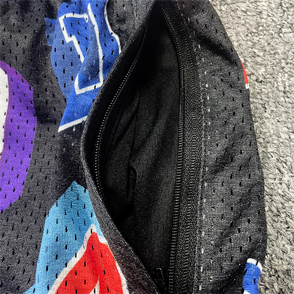 Short de basket-ball tendance en maille avec broderie de lettres par sublimation