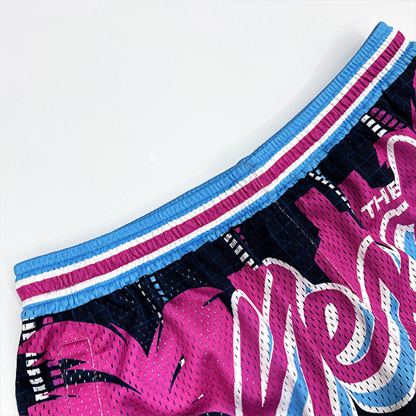 Pantalones cortos de baloncesto con bordado de doble capa