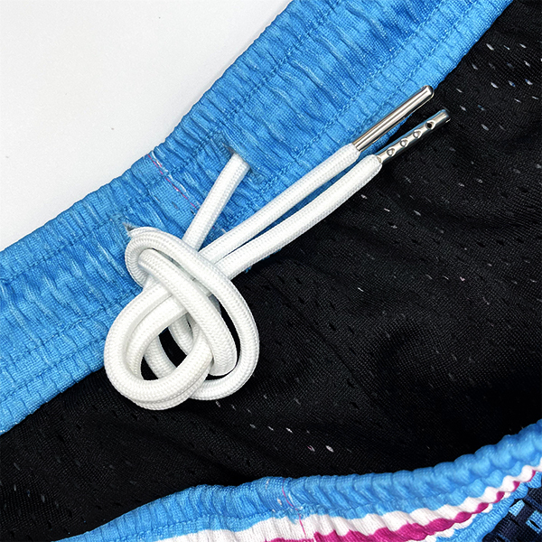 Pantalones cortos de baloncesto con bordado de doble capa