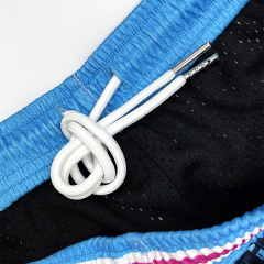 Pantalones cortos de baloncesto con bordado de doble capa