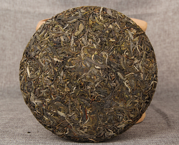 2014 Mengku Bangdong Tea Ancient Tree Mingqian Spring Tea Raw Tea Cake