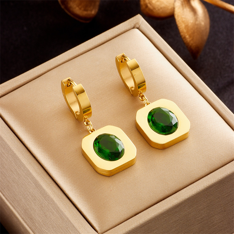 Niche luxury retro design titanium steel emerald zircon earrings and necklace set for elegant women.