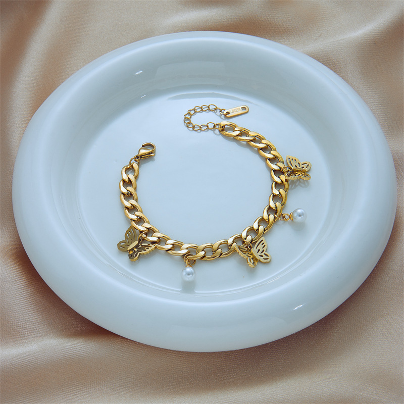 European and American fashion niche design chain titanium steel metal pearl butterfly pendant jewelry bracelet with irregular design