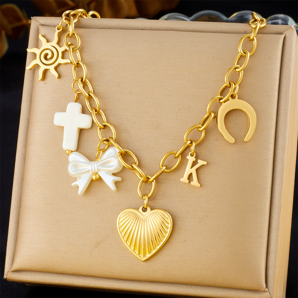 New cross-border fashion retro multi-element heart bow seashell cherry cross eye chain necklace