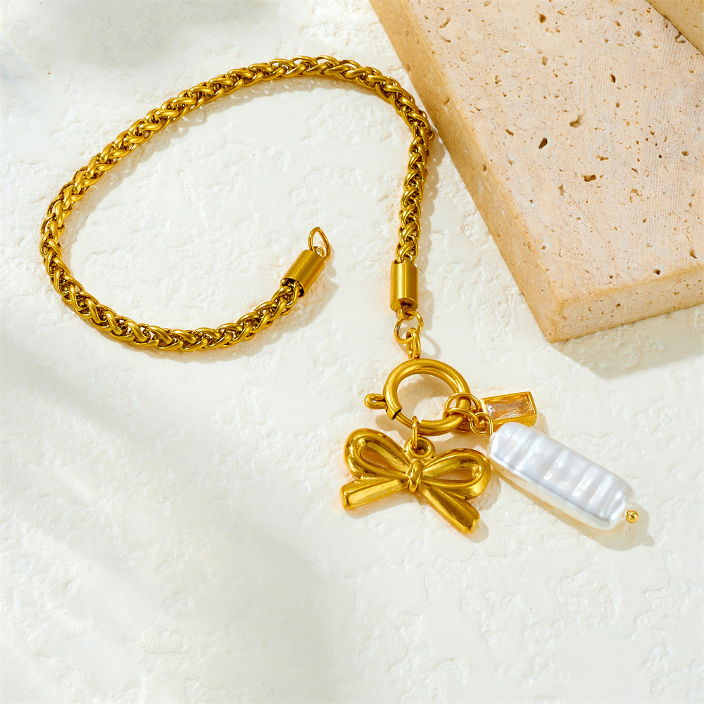 Korean style, fashionable and elegant, simple gold-plated braided chain with bow and seashell pendant, stainless steel gold-plated bracelet.