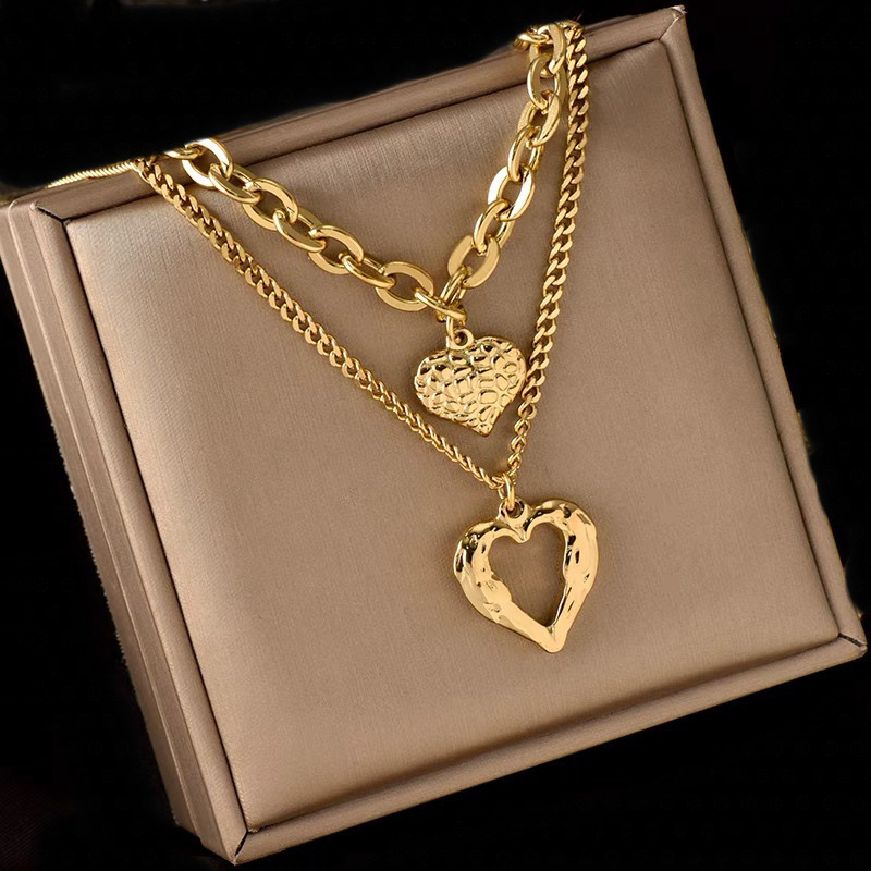 European and American cross-border retro fashion high-end minimalist multi-layer titanium steel metal chain textured hollow heart pendant necklace